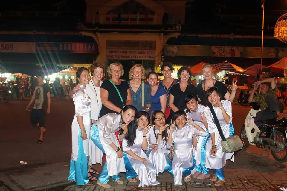 Standing in front of the Binh Tay Market on the XO Foodie tour